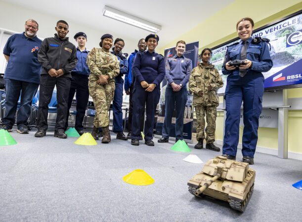 YOU London cadets playing with a remote controlled army tank during a training exercise