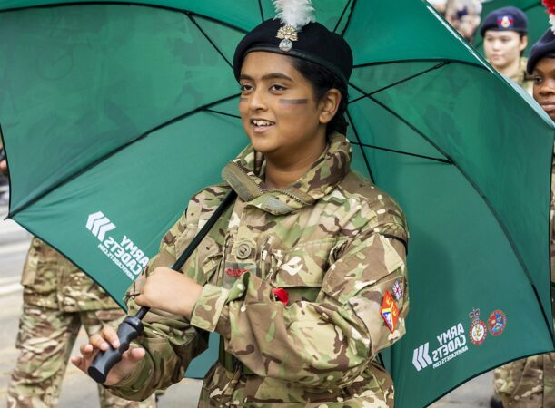 A cadet holding an umbrella during the Lord Mayor's Show 2022